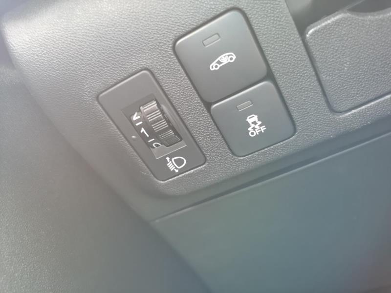 雪铁龙c3-xr，雪铁龙C3XR2017自动智能型ESC上面的那个按钮是什么意思啊，还有这辆车可以做到车内控制后备箱打开吗，看到网上有卖那种控制按钮