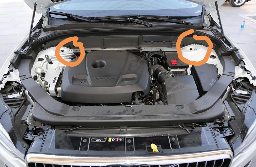 沃尔沃XC60 画圈的位置是什么功能，提车三周了，今天打开机盖才发现：这两处我的小沃没有图示的胶皮帽，是金属口裸露的，有